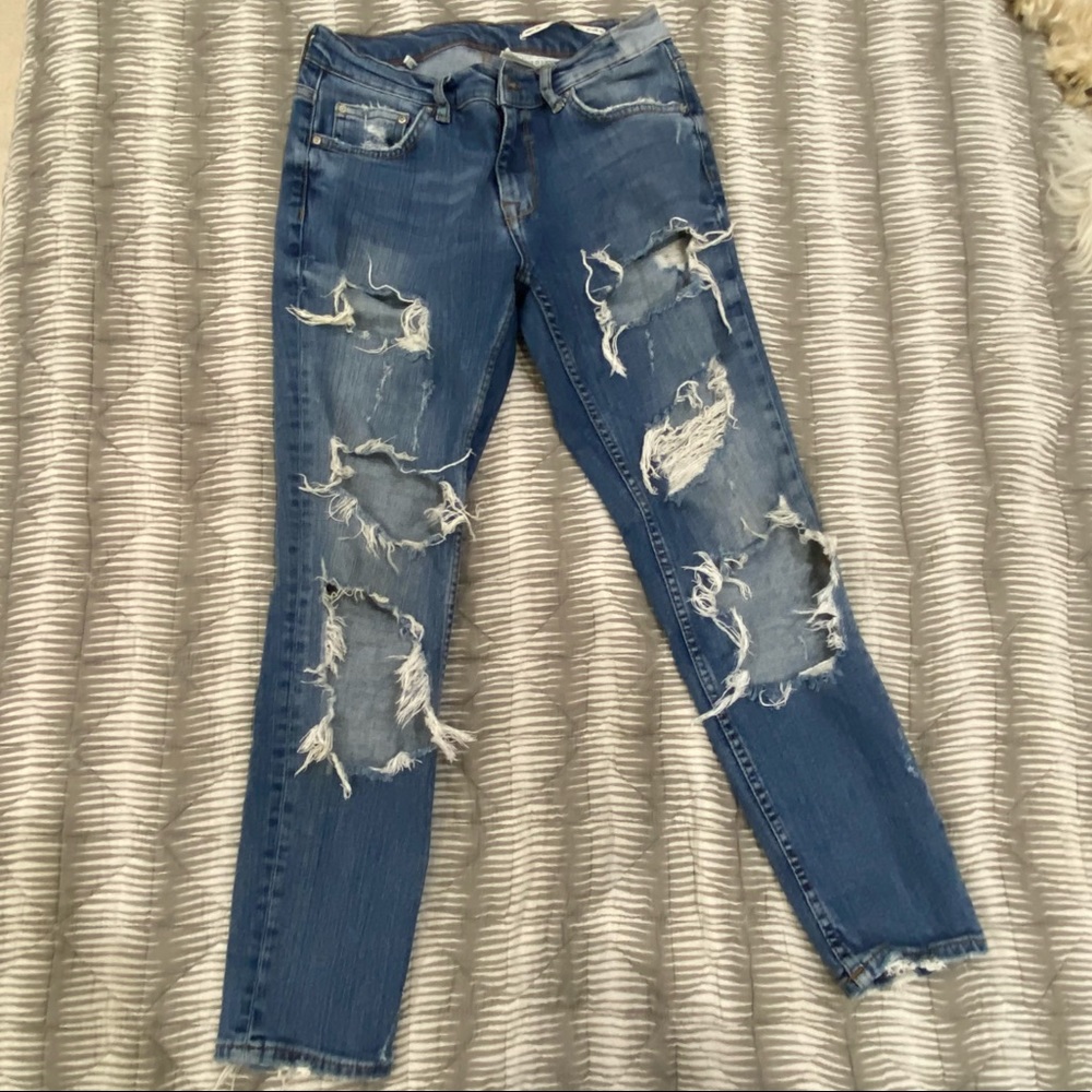 Zara medium wash ripped jeans.